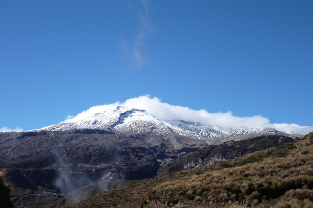 Glacier zone Colombia, big mountain with snow on the top, nature and blue sky, nevado