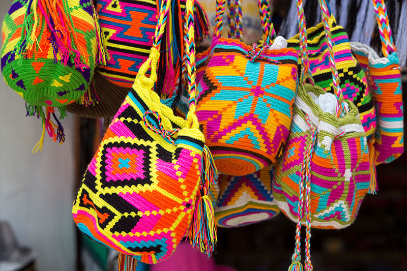 Discover the history and the technique of the Wayuu mochila bag | Colombia Country Brand