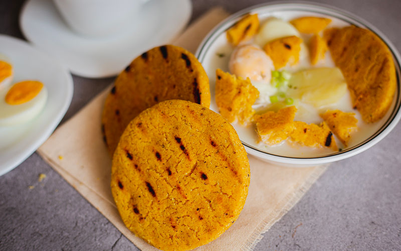 The arepa santandereana is a corn cake with chicharron in the dough | Colombia Country Brand