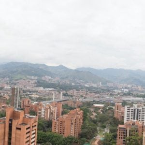 Panoramic view of Medellín and its lovely infrastructure, a city where you can visit coffee farms nearby.