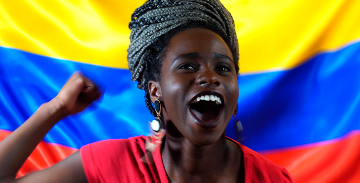 Femme colombienne fêtant le jour de l'indépendance de la Colombie - Les colombiens sont passionnés | Marque Pays Colombie