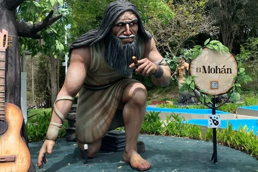 Statue of El Mohán, a mythical bearded figure with a fierce expression in Colombia