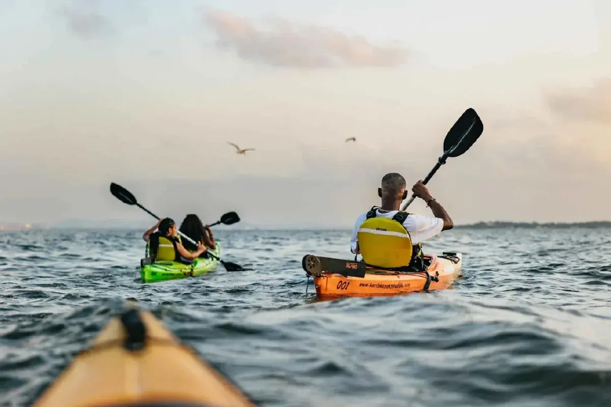 Family kayaking in Cartagena waters