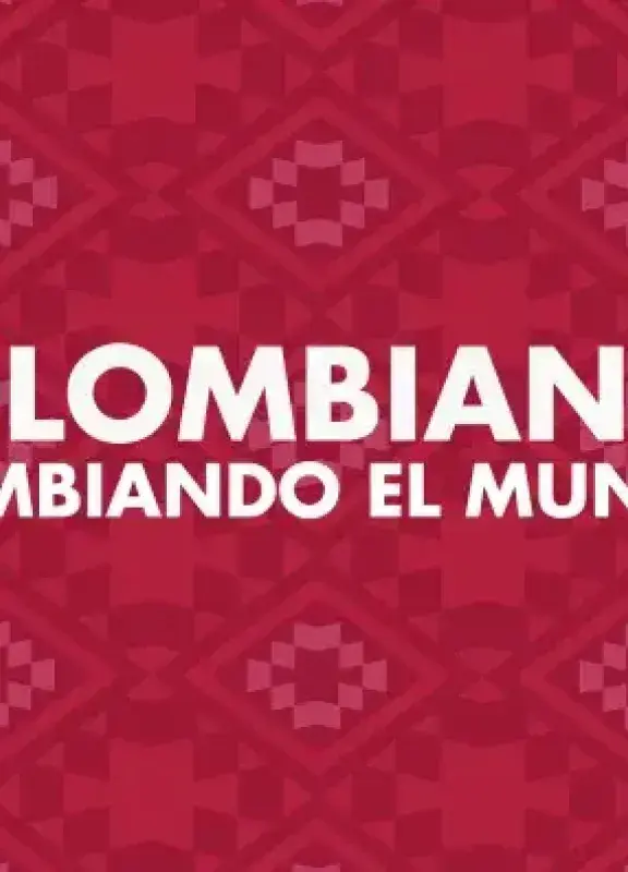 Frase Colombianos cambiando el mundo sobre fondo rojo Frase Colombianos cambiando el mundo sobre fondo rojo